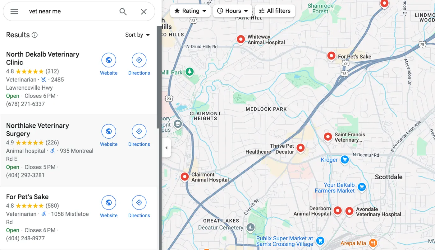A Google Maps search for 'vet near me', with the ranked local results listed down the left — each showing a star rating, review count, address, opening hours and phone number, plus Website and Directions buttons — beside a map of the pinned businesses.