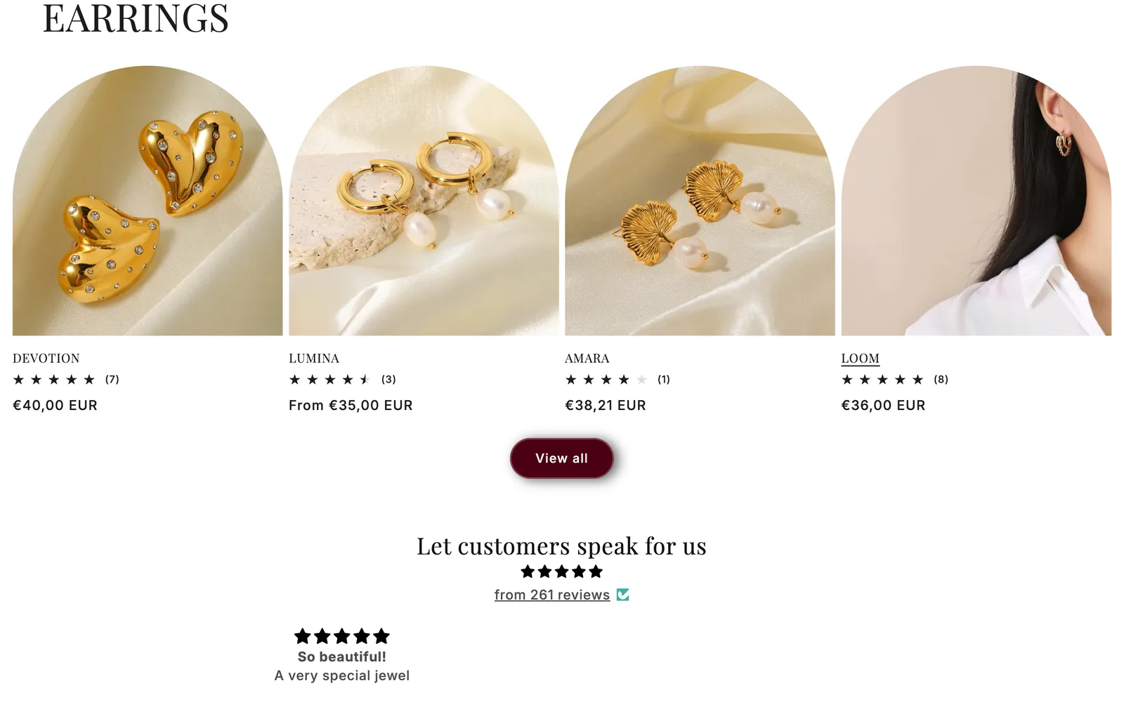 The earrings collection on the Diamora store, showing four products with photography, star ratings and prices, above a customer review summary reading five stars from 261 reviews.
